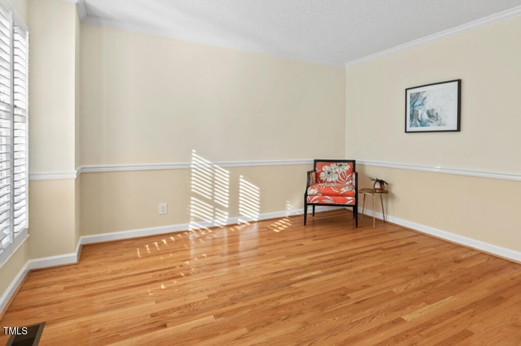 3100 Wilderness Road Durham, NC 27712 - Photo 6 of 35 a living room with wooden floor and furniture