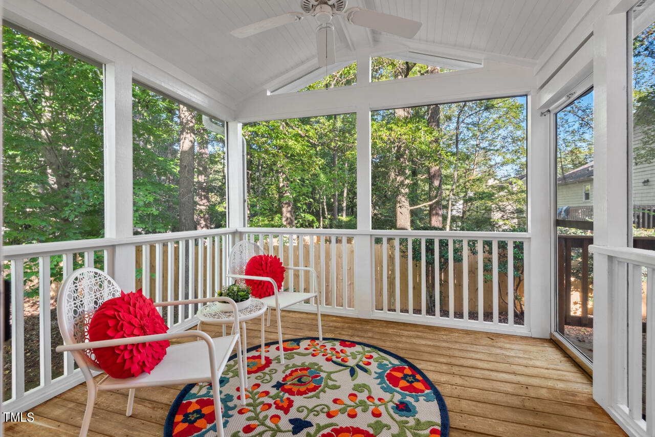 3100 Wilderness Road Durham, NC 27712 - Photo 10 of 35 a balcony with wooden floor and windows
