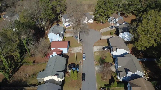 a view of a lake in middle of the forest