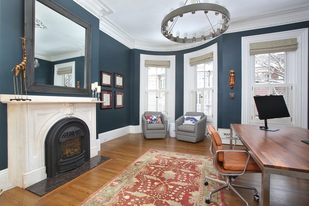 14 Rutland Square Boston, MA 02118 - Photo 18 of 19 a living room with furniture and a fireplace