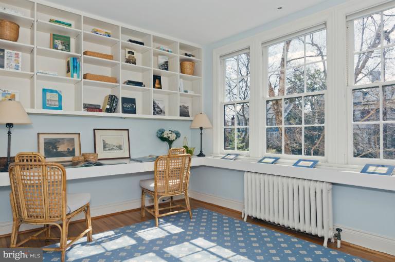 3219 Klingle Road Northwest Washington, DC 20008 - Photo 14 of 30 a view of a workspace with furniture and a window