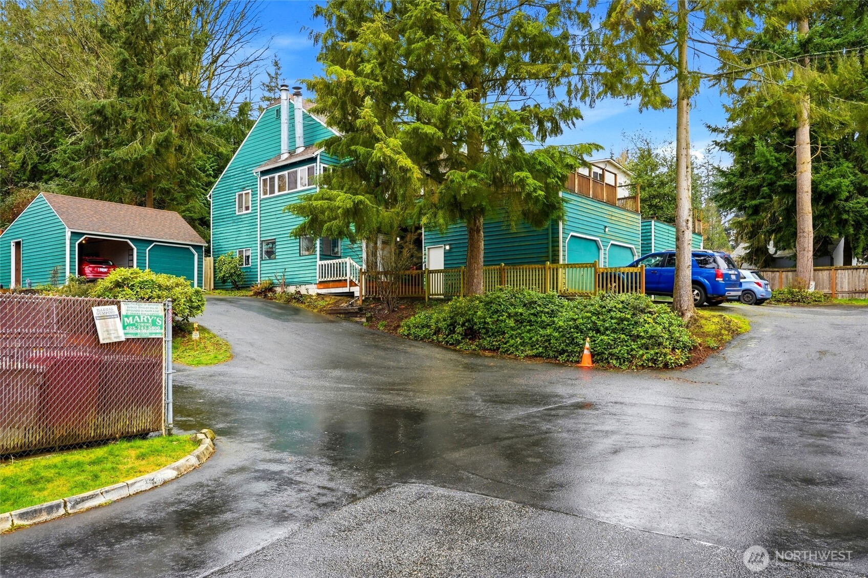 4404 Terrace Drive, Unit 8 Everett, WA 98203 - Photo 1 of 23 a front view of a house with garden