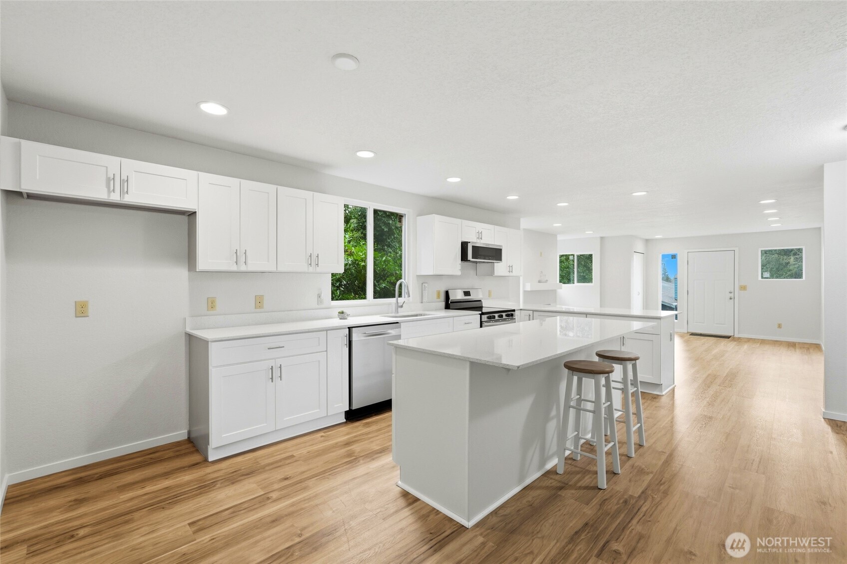 4404 Terrace Drive, Unit 8 Everett, WA 98203 - Photo 11 of 23 a kitchen with white cabinets and sink