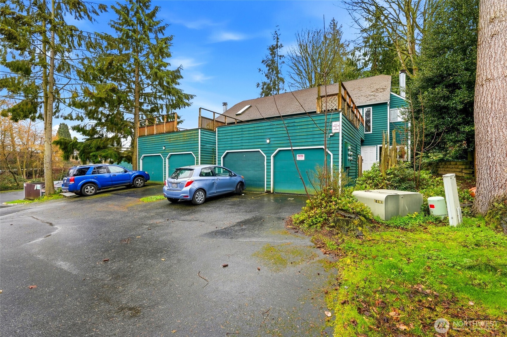 4404 Terrace Drive, Unit 8 Everett, WA 98203 - Photo 22 of 23 a couple of cars parked in front of a house