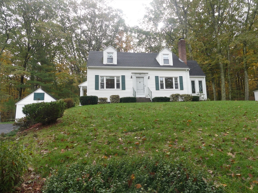 151 Fowler Road Northbridge, MA 01534 - Photo 1 of 29 a front view of a house with a yard and trees