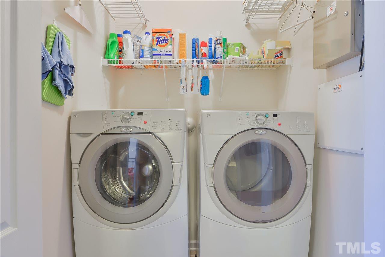 3412 Secretariat Way Raleigh, NC 27614 - Photo 14 of 25 a utility room with dryer and washer