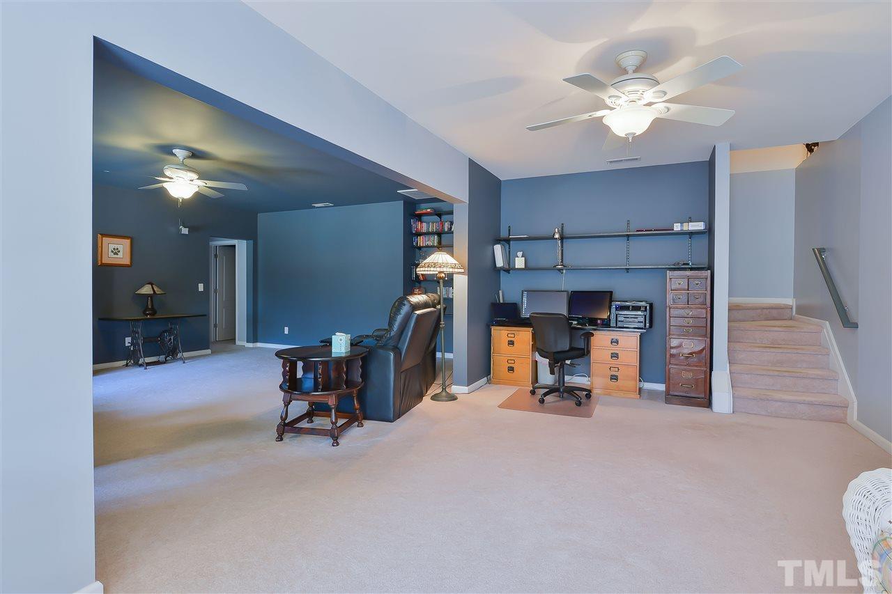 3412 Secretariat Way Raleigh, NC 27614 - Photo 22 of 25 a view of a room with gym equipment
