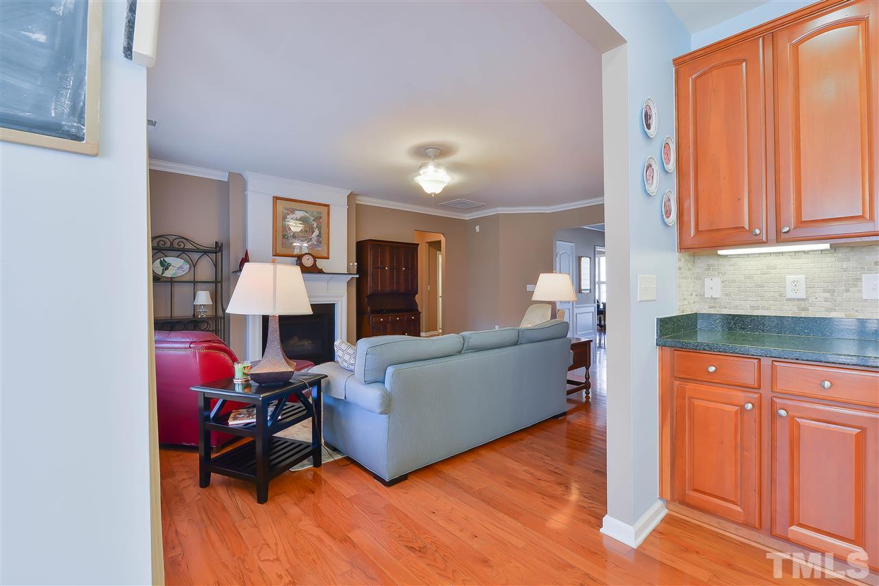 3412 Secretariat Way Raleigh, NC 27614 - Photo 8 of 25 a living room with furniture window and a wooden floor