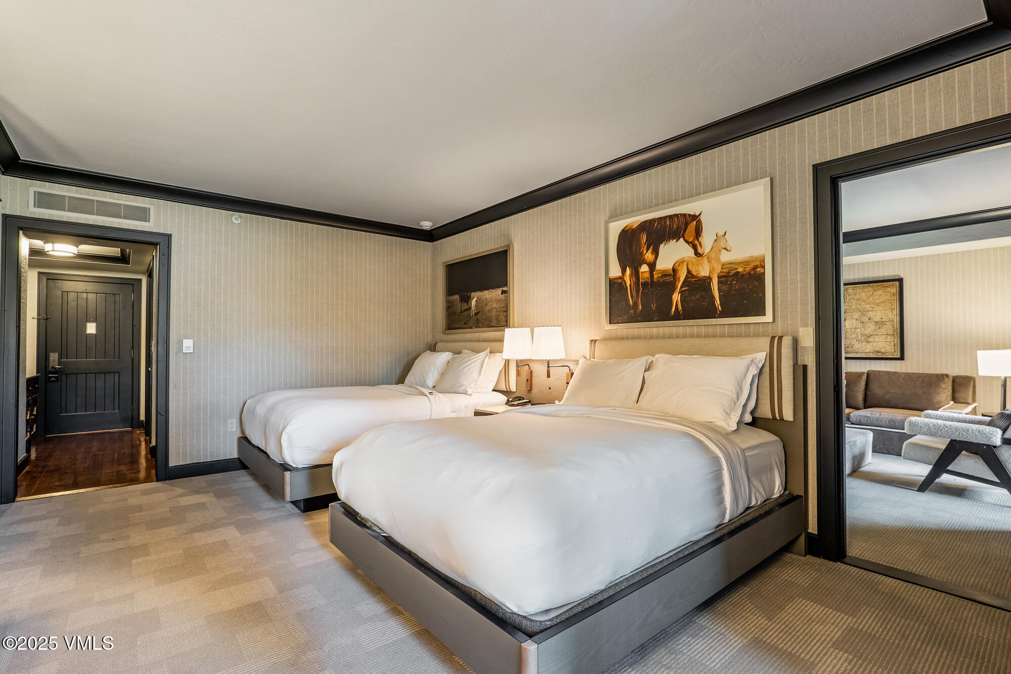 130 Daybreak Ridge Road, Unit HS319 Avon, CO 81620 - Photo 15 of 30 a bedroom with bed and wall painting