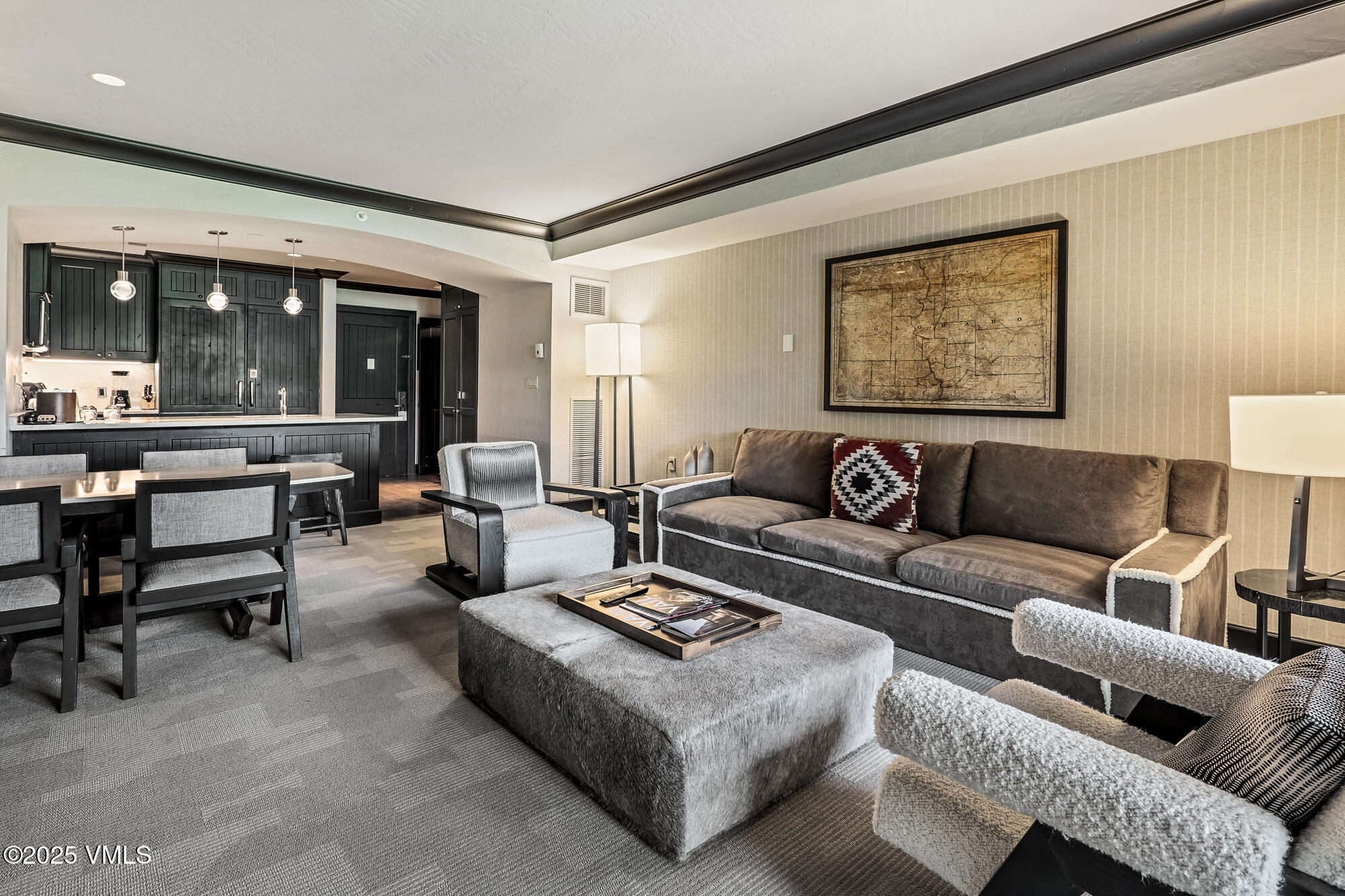 130 Daybreak Ridge Road, Unit HS319 Avon, CO 81620 - Photo 3 of 30 a living room with furniture and a large window