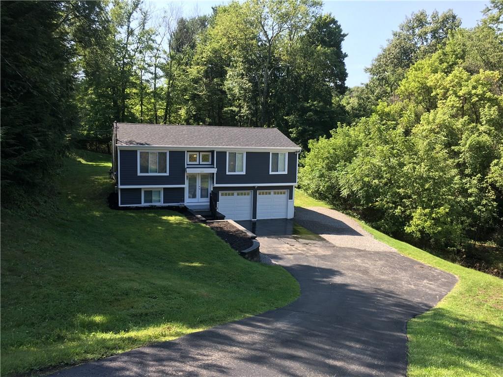 184 Manor Road Wexford, PA 15090 - Photo 10 of 11 Finished gameroom on lower level where the quality and attention to detail continue! Beautiful flooring, oversized baseboards, new lighting, and more! The laundry and a half bath are located on this level; as is access to the garage.