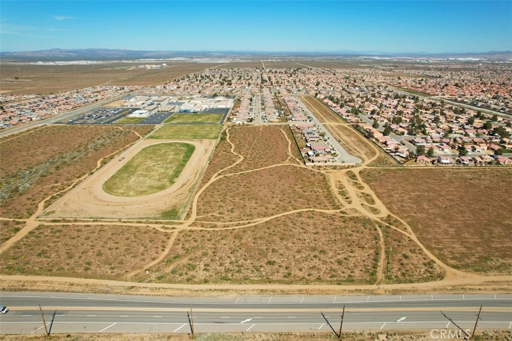5 Palmdale Road Adelanto, CA 92301 - Photo 29 of 33 a view of a swimming pool and an ocean view