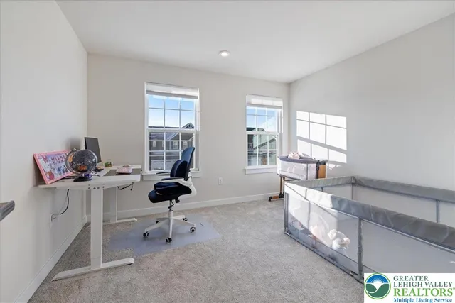 a bathroom with a double vanity sink toilet mirror and shower