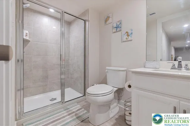 a view of a patio with table and chairs