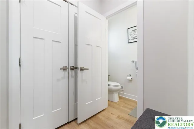 a view of a patio with table and chairs and potted plants