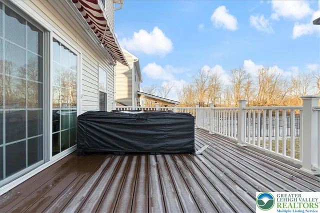 a view of a hallway with washer and dryer