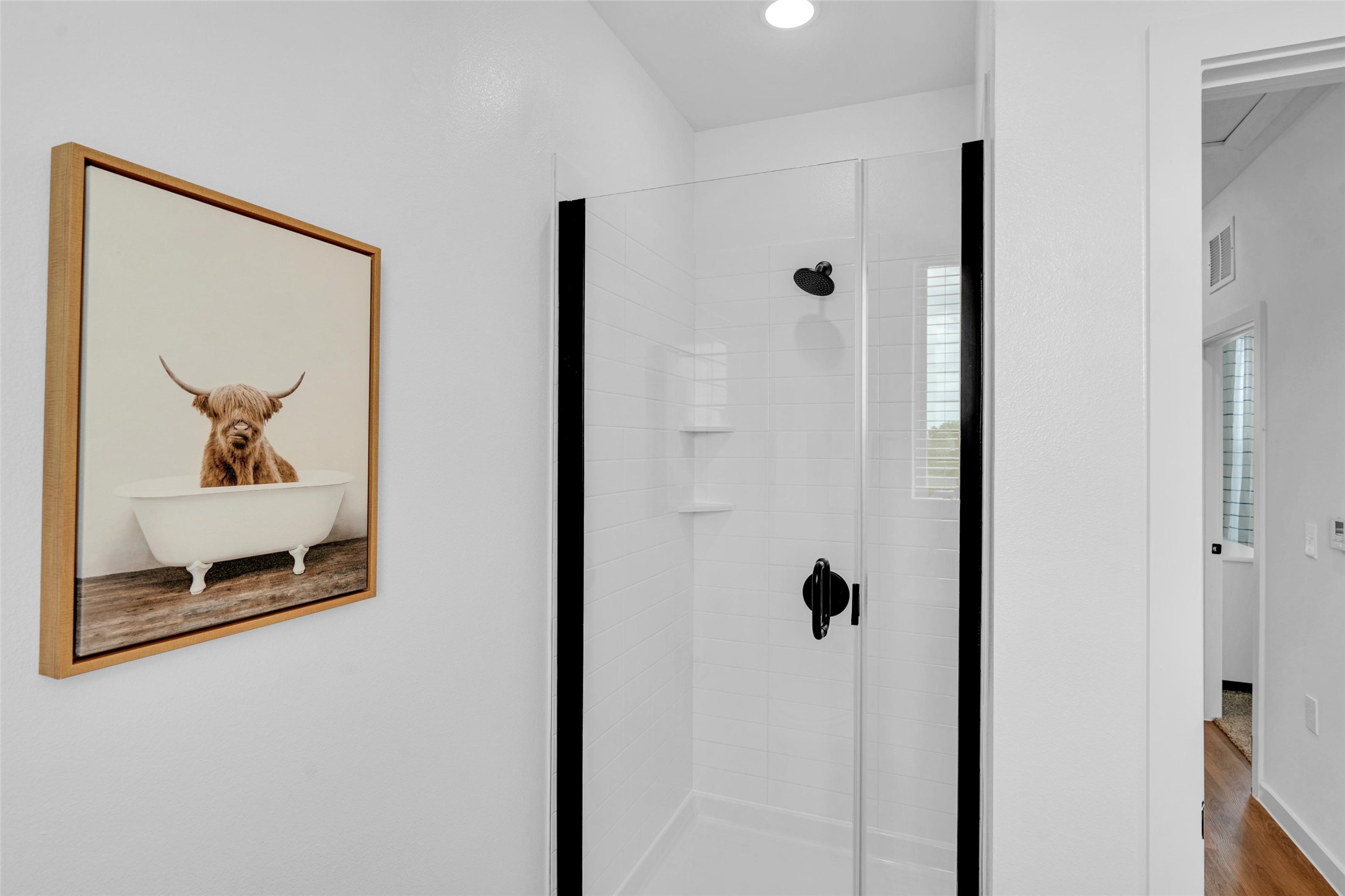 1428 B Izzy Lane Little Elm, TX 75068 - Photo 22 of 41 a view of a hallway with wooden floor and closet
