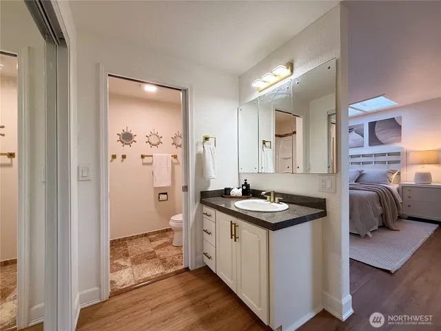 a kitchen with a sink stove and refrigerator