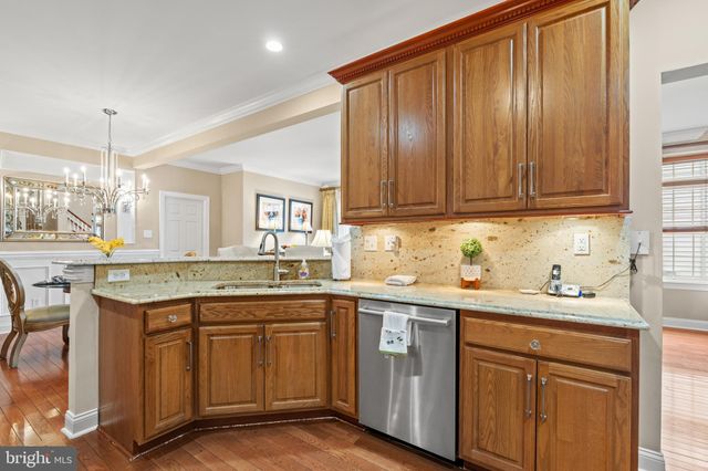 a bed room with a bed and a chair