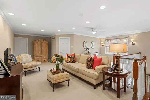 a view of a room with gym equipment and a large window