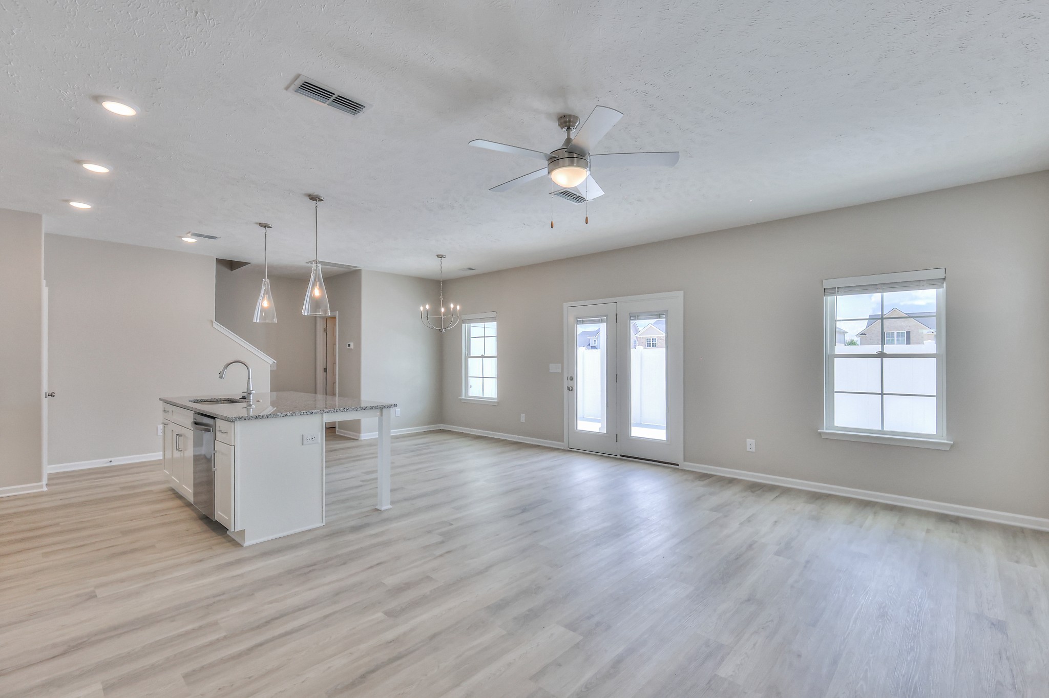 21 Hardwood Road Normandy, TN 37360 - Photo 5 of 29 a kitchen with white cabinets and wooden floor