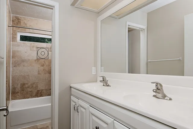 a bathroom with a sink and a bathtub