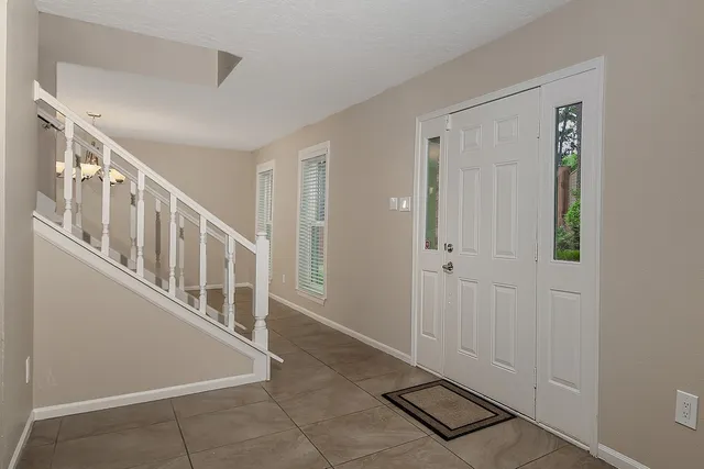 a view of an entryway with staircase