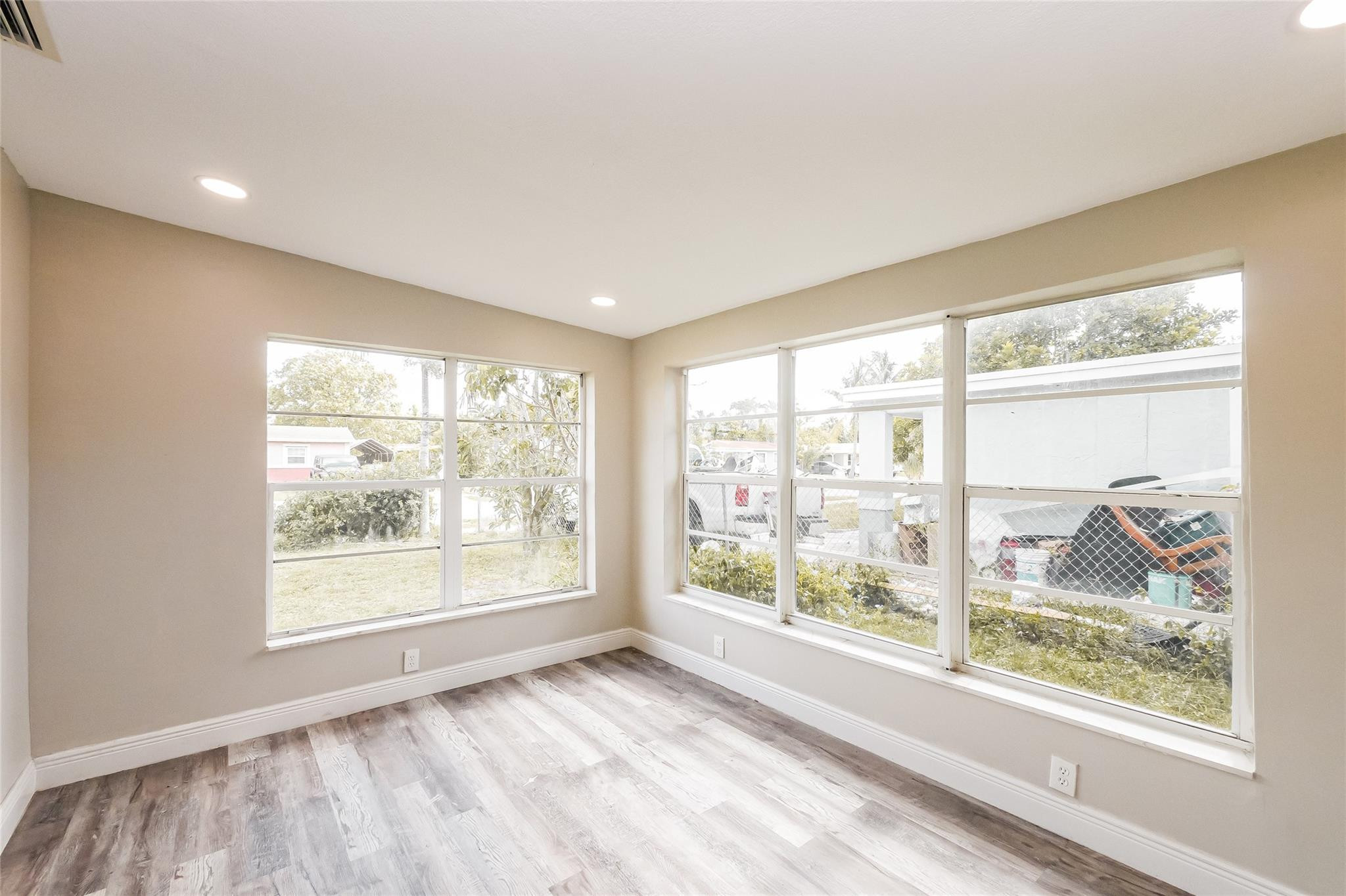 730 Northwest 18th Street Pompano Beach, FL 33060 - Photo 13 of 15 a view of an empty room with a window