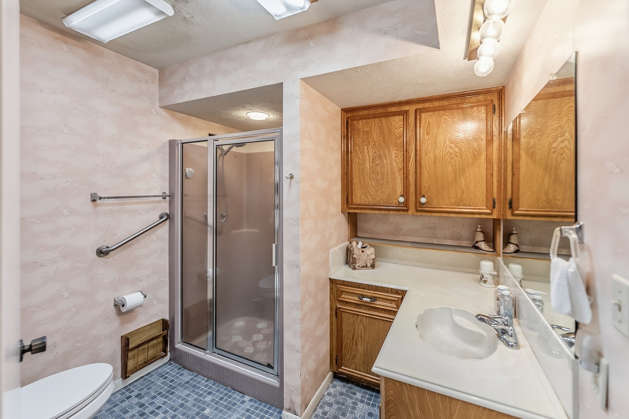 46 Point Loop Huntsville, TX 77320 - Photo 25 of 49 a bathroom with a sink toilet and shower