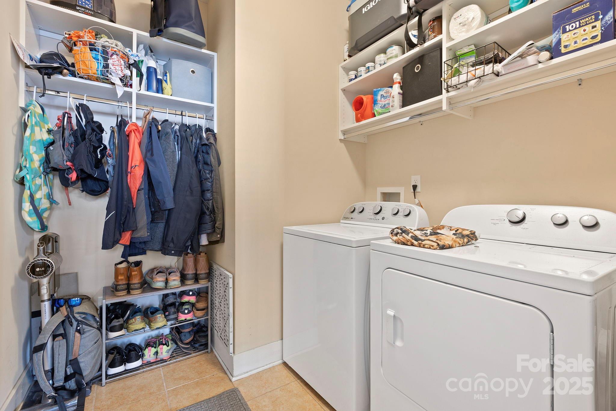 28 South River Road Fletcher, NC 28732 - Photo 26 of 47 a view of walk in closet with clothes and shoes