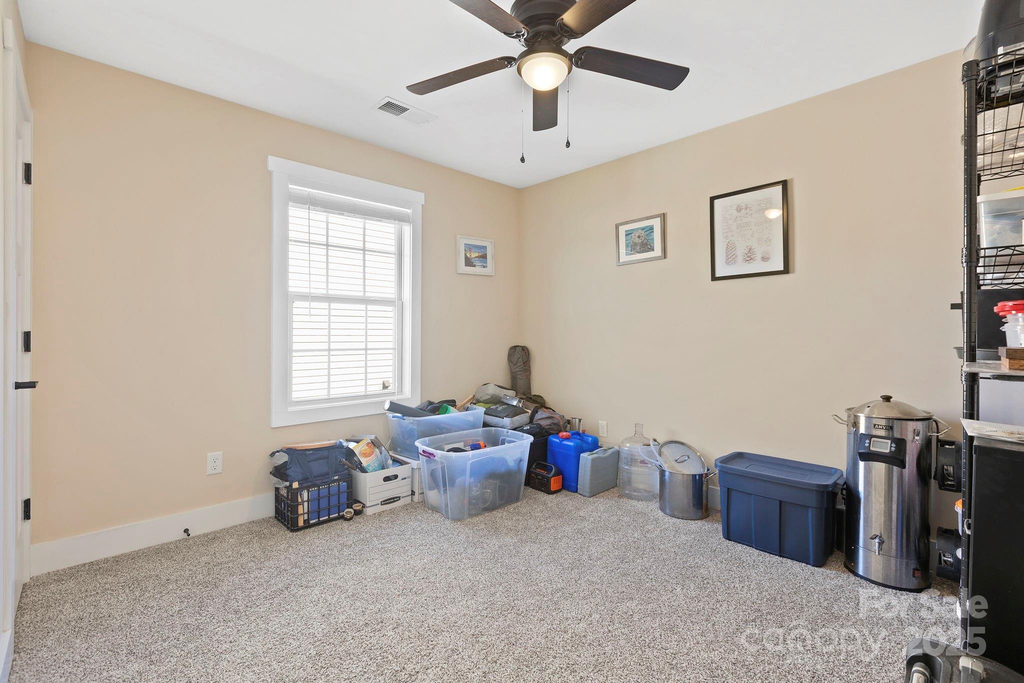 28 South River Road Fletcher, NC 28732 - Photo 31 of 47 a bedroom with furniture and a window