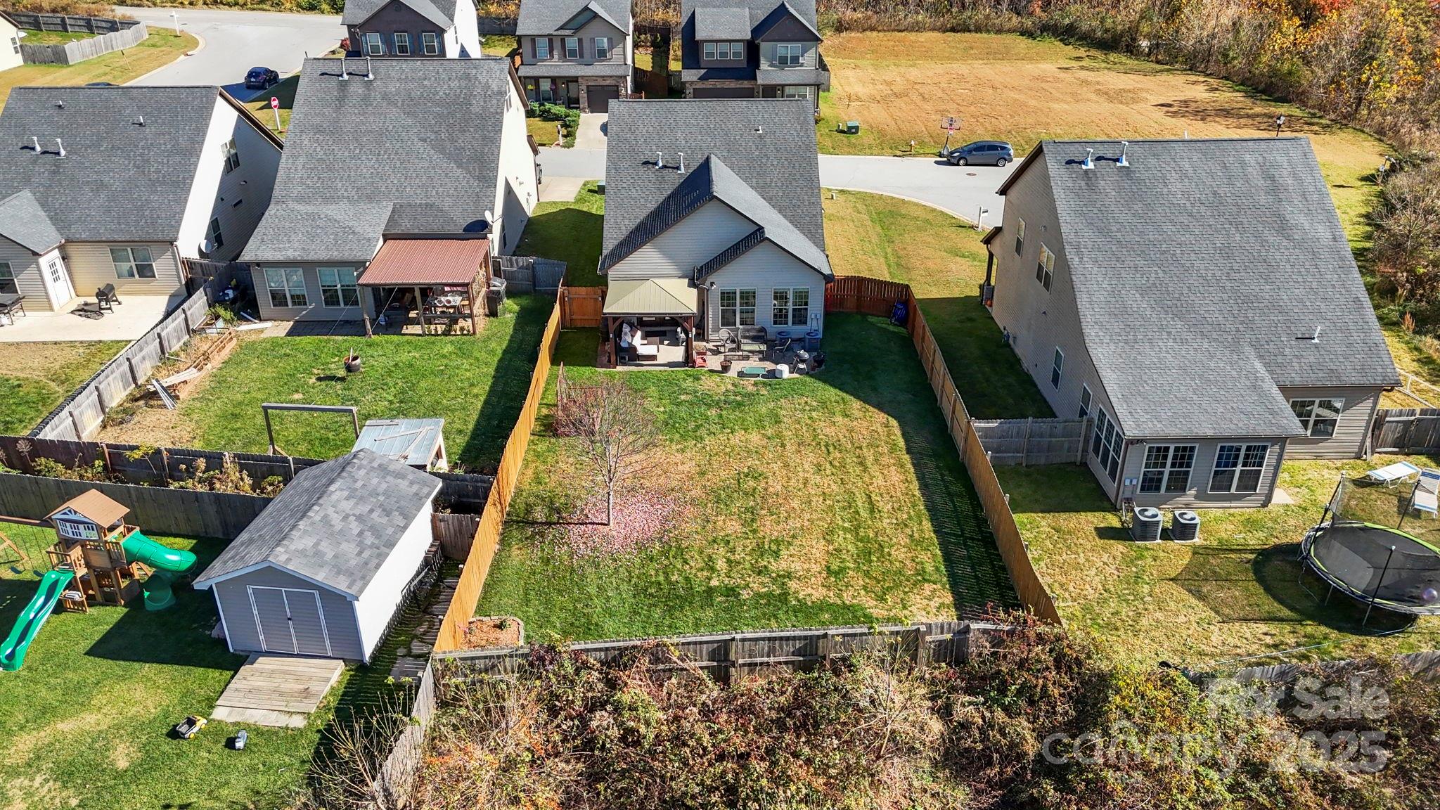 28 South River Road Fletcher, NC 28732 - Photo 34 of 47 an aerial view of a house with swimming pool