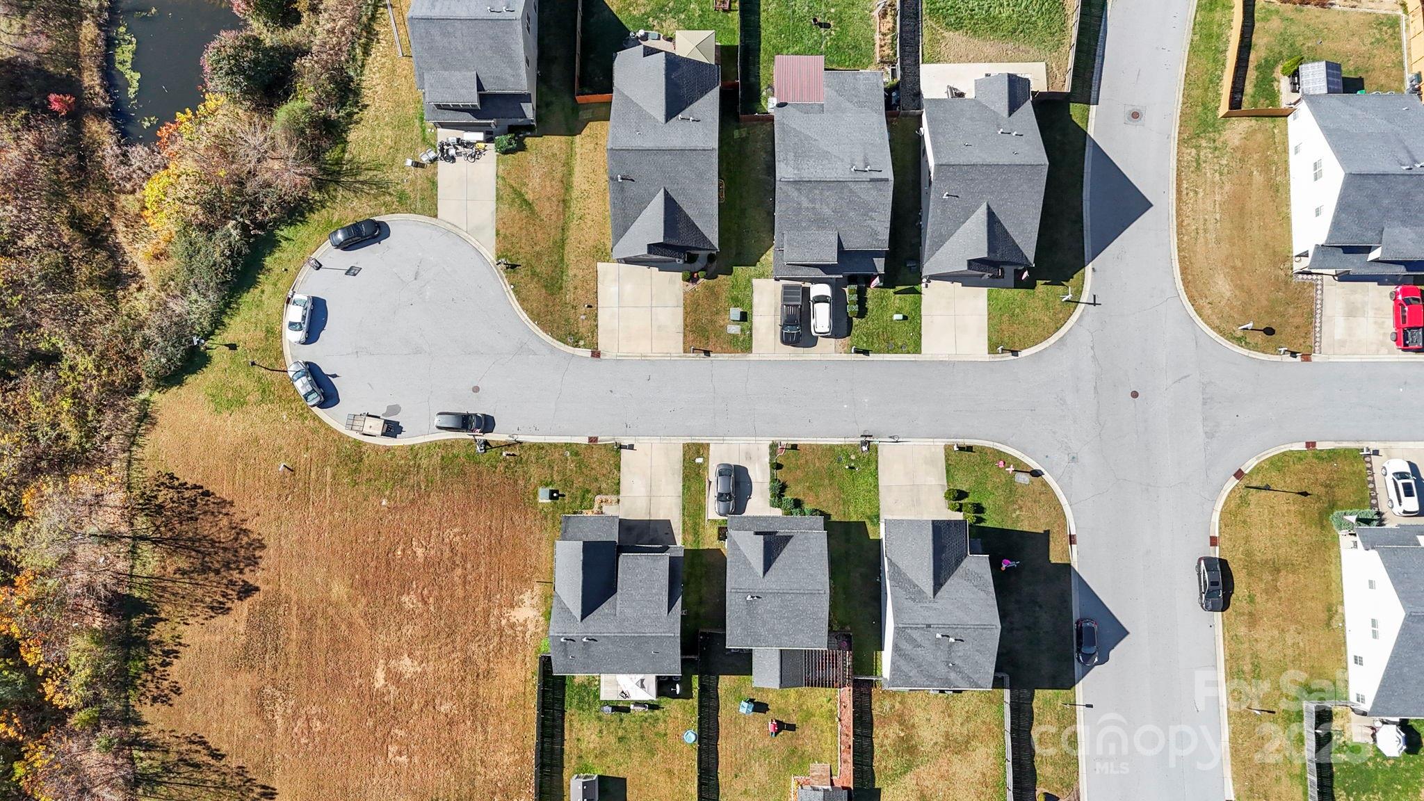 28 South River Road Fletcher, NC 28732 - Photo 40 of 47 an aerial view of residential houses with outdoor space