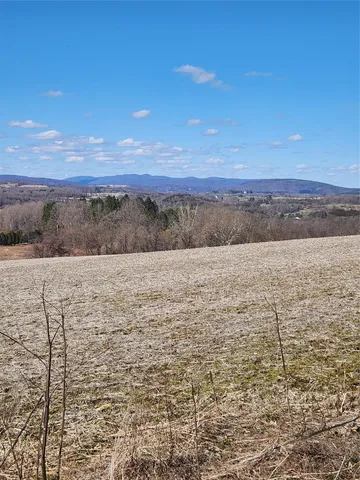 a view of lake with mountain