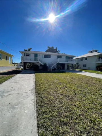 a view of swimming pool with outdoor space and seating area