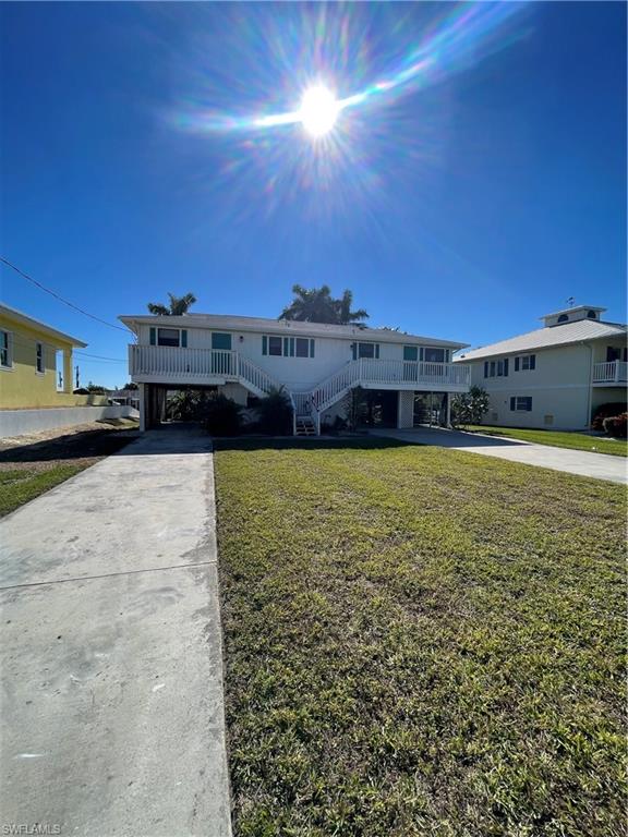 4861 Regal Drive Bonita Springs, FL 34134 - Photo 12 of 33 a view of swimming pool with outdoor space and seating area