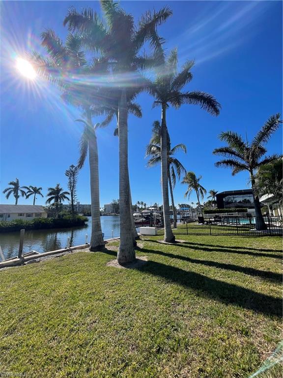 4861 Regal Drive Bonita Springs, FL 34134 - Photo 13 of 33 a view of a lake with a big yard