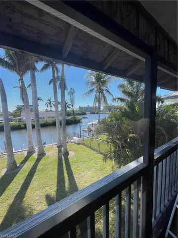 a view of swimming pool from a window
