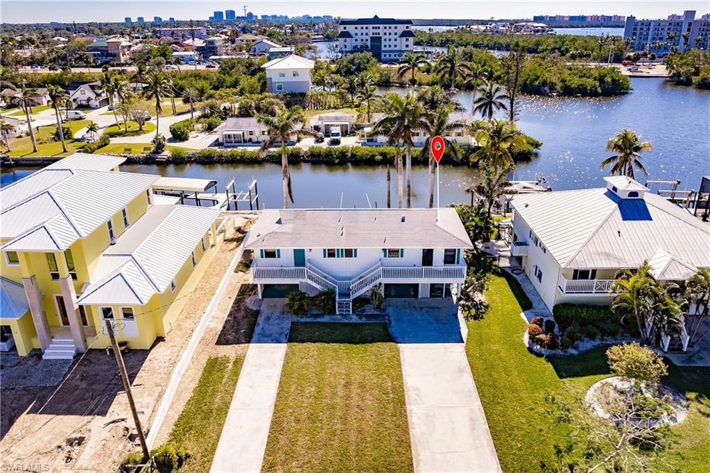 4861 Regal Drive Bonita Springs, FL 34134 - Photo 2 of 33 a view of a lake with sitting area