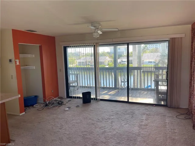 a view of an empty room and window