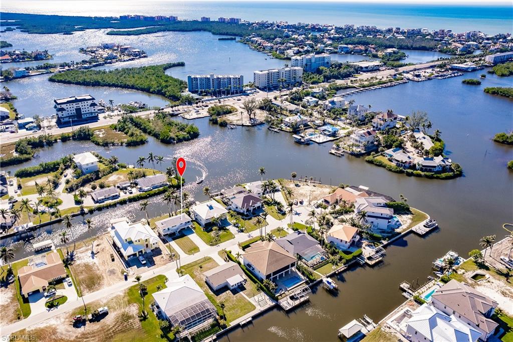 4861 Regal Drive Bonita Springs, FL 34134 - Photo 3 of 33 an aerial view of a house with a ocean view