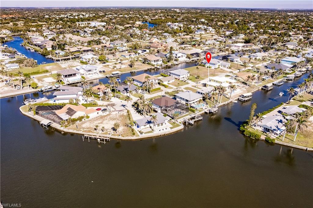 4861 Regal Drive Bonita Springs, FL 34134 - Photo 4 of 33 an aerial view of residential houses with outdoor space