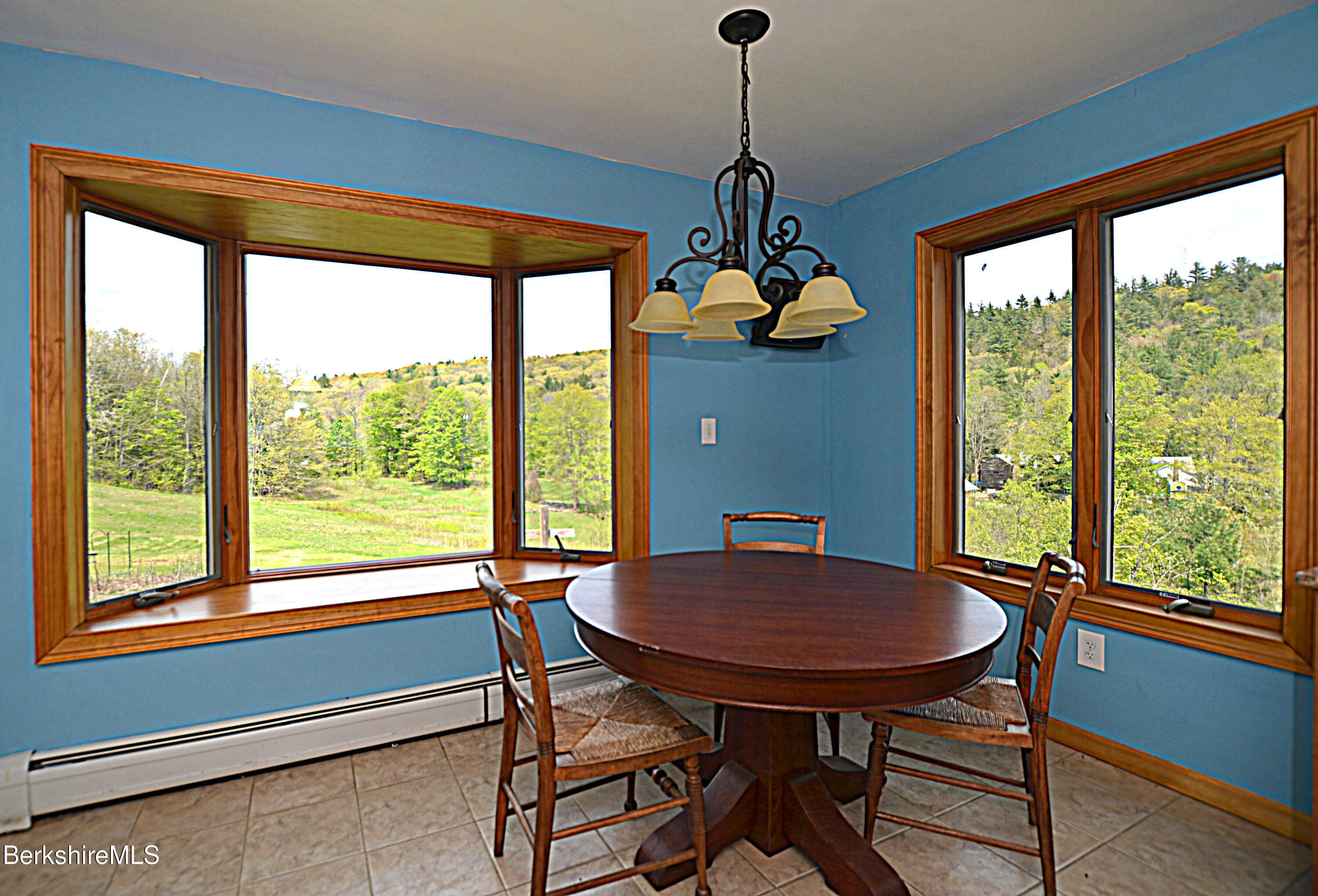 104 North Chester Road Chester, MA 01011 - Photo 19 of 54 a view of a dining room with furniture window and outside view