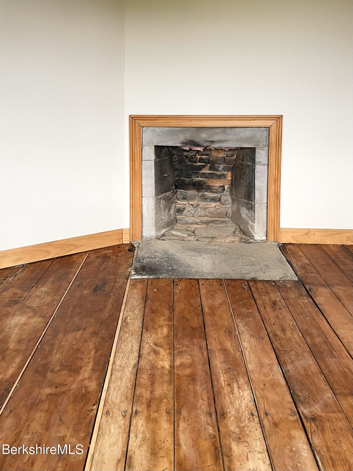 104 North Chester Road Chester, MA 01011 - Photo 23 of 54 a view of a fireplace in a room