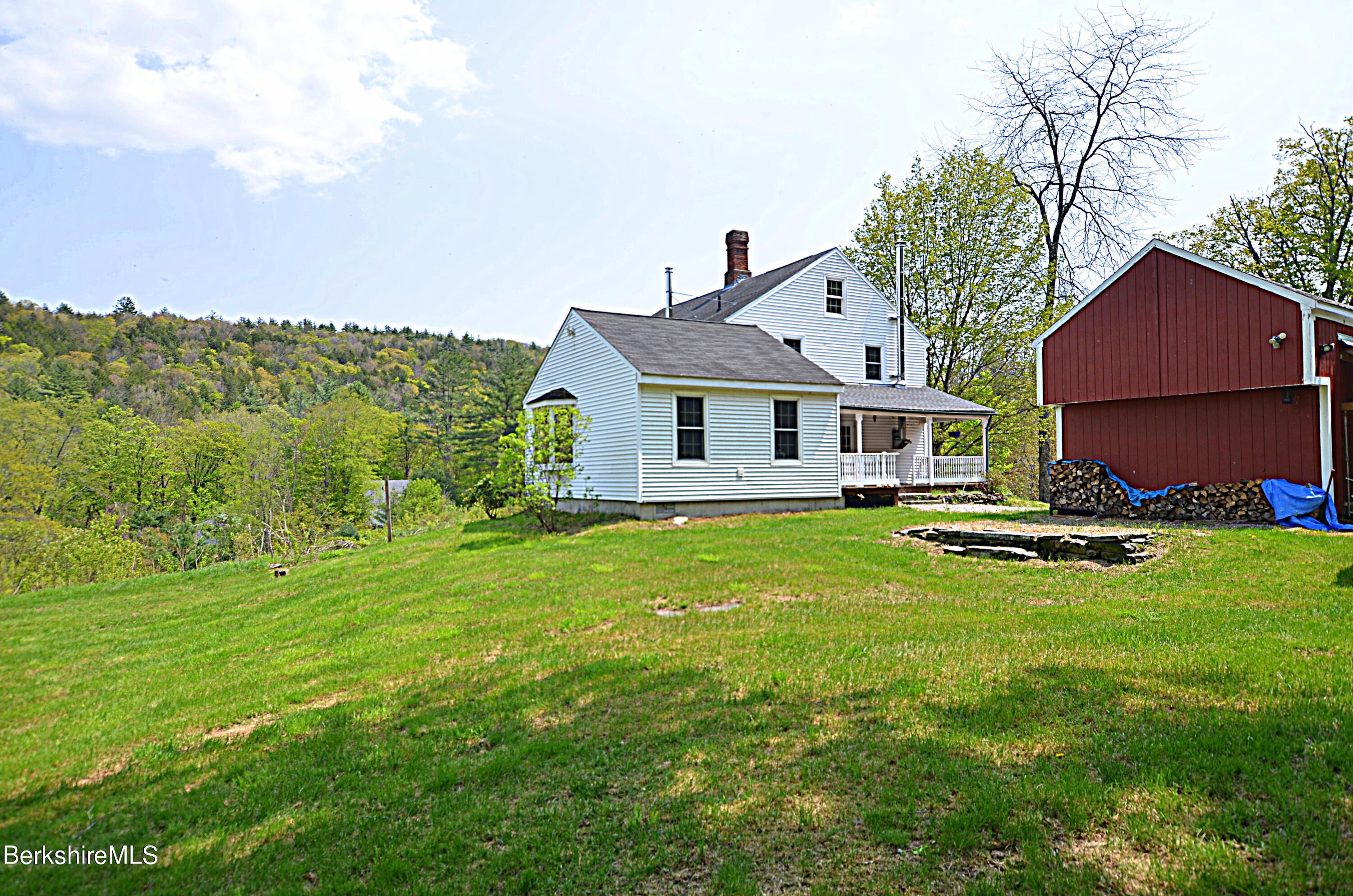 104 North Chester Road Chester, MA 01011 - Photo 54 of 54 a front view of house with yard and green space