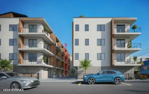 a kitchen with stove and cabinets
