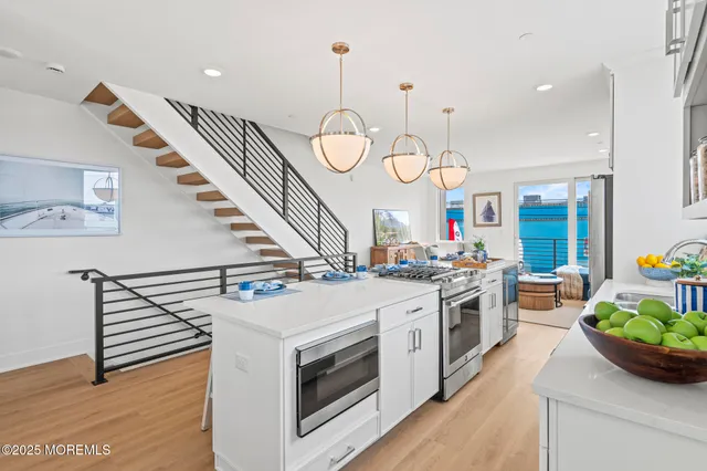 a bathroom with a sink a mirror and a toilet