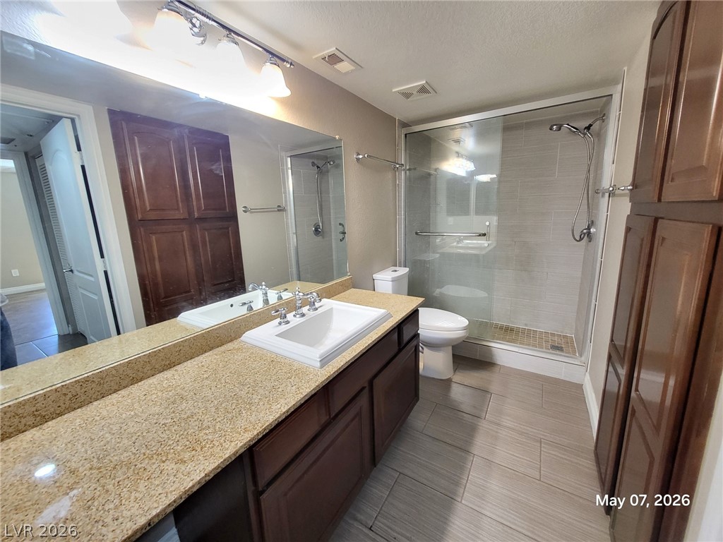 8101 West Flamingo Road, Unit 1160 Las Vegas, NV 89147 - Photo 12 of 18 This bright bathroom features a spacious shower and ample counter space, perfect for your daily routine.