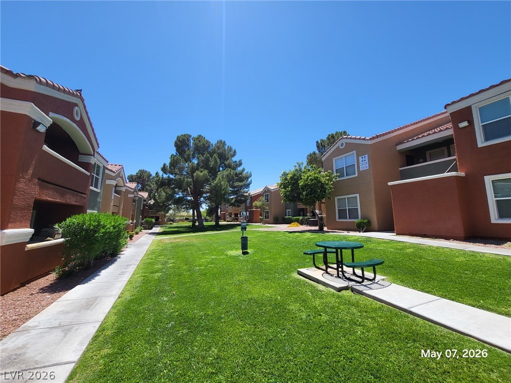 8101 West Flamingo Road, Unit 1160 Las Vegas, NV 89147 - Photo 18 of 18 This complex offers a vibrant setting with lush green spaces and outdoor dining areas.