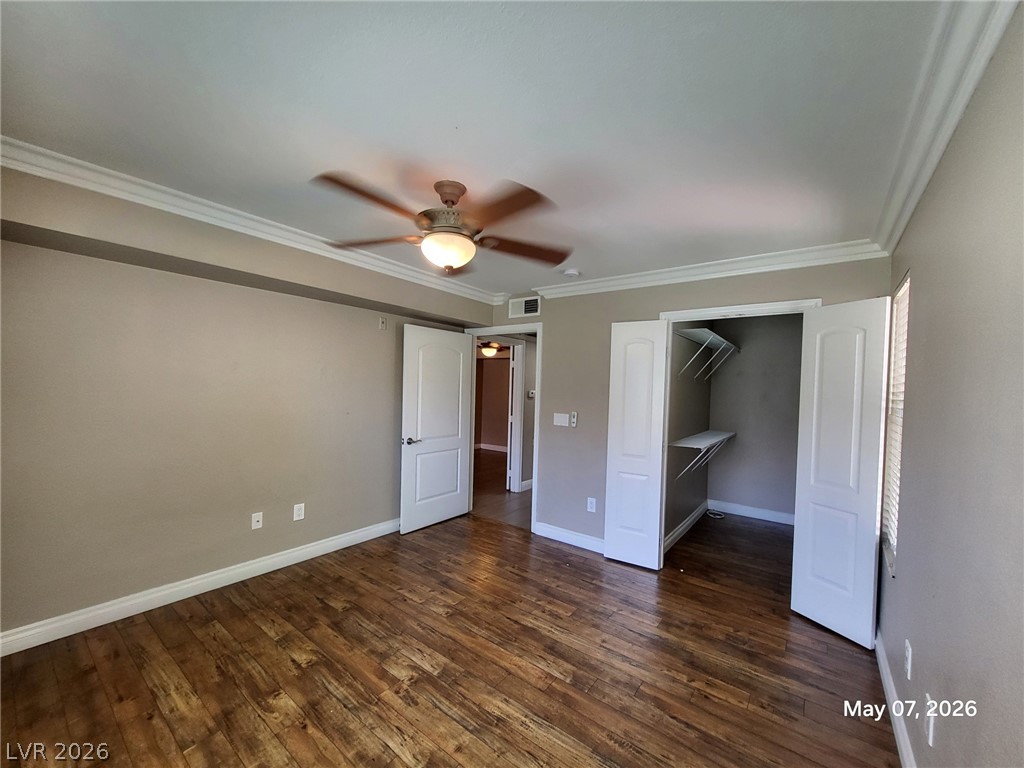 8101 West Flamingo Road, Unit 1160 Las Vegas, NV 89147 - Photo 9 of 18 This inviting bedroom offers rich hardwood flooring and a convenient walk-in closet.